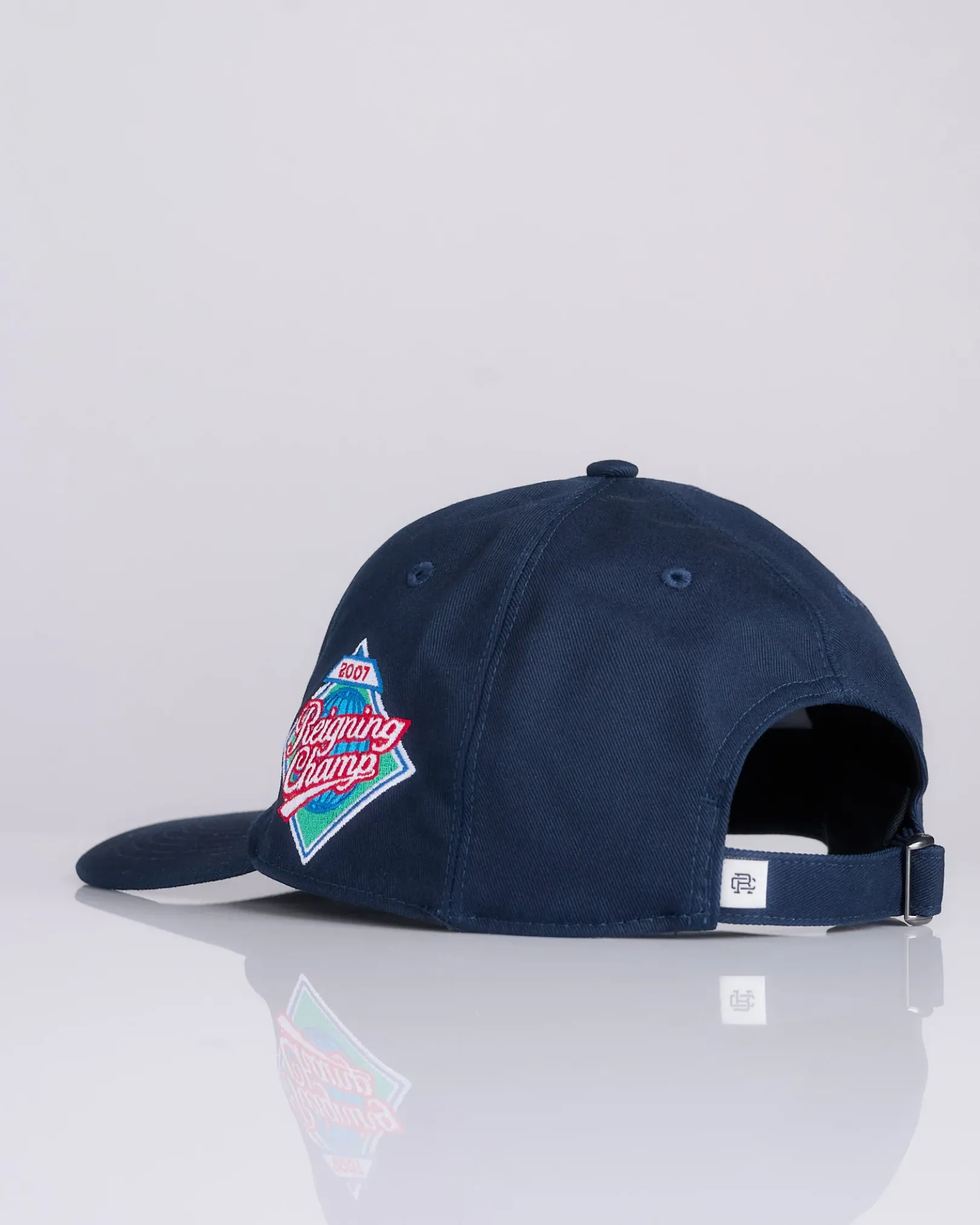 Online Reigning Champ Outfield Strapback Cap Navy White
